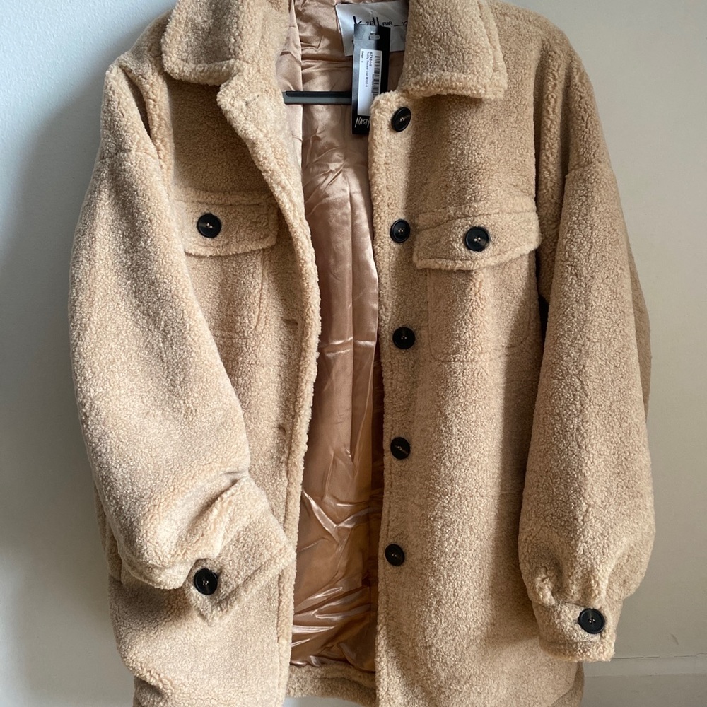 Brand new, never worn teddy coat from Nasty Gal. Tags still on